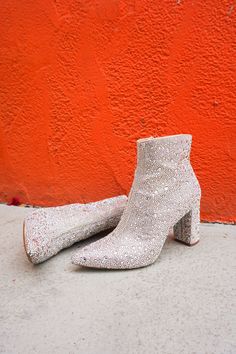 Rhinestone Booties Sparkling Pointed Toe Heels For Fall, Glamorous Sparkling Boots For Party Season, Chic Fall Boots With Bling, Glamorous Crystal Embellished Spring Boots, Glamorous Crystal-embellished Spring Boots, Glamorous Winter Heeled Boots, Rhinestone Heeled Ankle Boots For Fall, Trendy Sparkling Boots For Fall, Glamorous Ankle Boots For Party Season