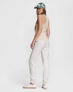 We spun your favorite slim cut workout tank into an elegantly sexy pointelle sweater tank. Athletic silhouette, cotton blend knit. rag & bone Women's Slim Fit Top | Ivory, Large (also in XXS,XS,S,M) Fitted Ribbed Tank Top For Loungewear, Chic Stretch Knit Top For Loungewear, Fitted Cotton Pointelle Knit Tank Top, Chic Seamless Tank Top For Loungewear, Chic Pointelle Knit Tank Top, Chic Stretch Tank Top With Pointelle Knit, Fitted Tank Top For Loungewear, Chic Stretch Pointelle Knit Tank Top, Fitted Ribbed Knit Top For Loungewear