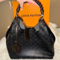 This Beautiful Louis Vuitton Monogram Mahina Carmel Hobo Bag In Black Isn’t Nearly As Worn As It Needs To Be! She Needs A New Home Asap! Light Luxury Black Bag With Branded Hardware, Designer Black Bag With Handles, Designer Black Bags With Handles, Designer Shoulder Bag With Palladium Hardware In Coated Canvas, Luxury Evening Bag In Signature Coated Canvas, Luxury Double Handle Shoulder Bag In Signature Coated Canvas, Luxury Signature Coated Canvas Evening Bag, Black Monogram Canvas Bag For Shopping, Black Monogram Canvas Shopping Bag