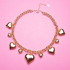 Let your heart shine out with this Juicy Heart Chain Necklace! With its delicate design and classic look, it's perfect for accessorizing any outfit, whether you're looking for something formal or something fun. Add a pop of color to your wardrobe! *14"-16" Adjustable Necklace (Sizes Available) *18K Gold Plated or Stainless Steel *Handmade in Los Angeles Metal Necklaces With Heart Charm For Party, Trendy Metal Heart Necklace With Heart Beads, Trendy Metal Heart Beads Necklace, Cute Heart Necklace For Valentine's Day Party, Trendy Heart-shaped Metal Charm Necklaces, Gold Heart Beads Necklace For Party, Trendy Necklaces For Valentine's Day, Trendy Valentine's Day Heart Necklace With Chain, Heart Charm Necklace For Party