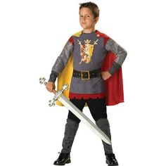 Step into the role of a brave knight with this detailed costume. Loyal Knight, Halloween Costume for Children, Boys Size S (6/7), by Way to Celebrate includes a tunic with an attached cape, pants, shin guards, and a belt. Designed for comfort, this costume is perfect for any child ready to embark on heroic adventures this Halloween. Your little knight will feel ready to defend the kingdom in this authentic-looking outfit. It's perfect for trick-or-treating or costume parties where they can showcase their bravery and chivalry. Color: Gray. Knight Costume For Kids, Fantasia Diy, Knight Halloween Costume, Costume Chevalier, Medieval Knight Costume, Knight Halloween, Knight Costume, Medieval Costume, Halloween Fancy Dress