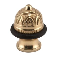 an antique brass plated knob with black rubber band and decorative design on the top