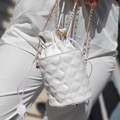 White Quilted Hand Bag With Detachable Gold Chain, Drawstring Closure, And Gold Feet Details. Size: 10" X 6" Approx. Brand: Unknown Price: $20 #Style #Fashion #Purse #Channices_chicboutique White Shoulder Box Bag With Dust Bag, Bucket Bag With Mobile Phone Bag, White Bucket Shoulder Bag With Mobile Phone Pocket, White Bucket Shoulder Bag With Phone Pocket, White Shoulder Bucket Bag With Mobile Phone Pocket, White Shoulder Bucket Bag With Phone Bag, Chic Bucket Shape Shoulder Bag With Zipper, Elegant White Bucket Bag With Mobile Phone Holder, Elegant White Bucket Bag With Phone Holder