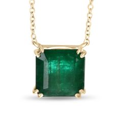 Featured here is a 3.10-carat stunning, Asscher cut emerald necklace in 14K yellow gold. Displayed in the center is a RARE, RICH dark green emerald with good eye clarity, accented by a simple double-prong gold mount, allowing for the emerald to be shown in full view. The earth mined emerald has a desirable lush green color with excellent qualities. An 18 inch is attached to the emerald pendant. This necklace is ideal for everyday use and is the perfect accessory for any outfit. Total Carat Weight: 3.10cts Setting Style: Double Prong Setting Material: 14K Yellow Gold Chain Lenght: 18 Inches Main Stone: Emerald Shape: Asscher Cut Approx Weight: 3.10cts Clarity: Semi-Translucent Saturation: Dark  Color: Rich Dark Forest Green Luster: Very Good Treatment: Natural, Oiled Origin: Brazil This mas Emerald Necklace Gold, Gold Emerald Necklace, Emerald Chain, Emerald Green Necklace, Emerald Style, Unique Pendant Necklace, Emerald Pendant, Asscher Cut, May Birthstone