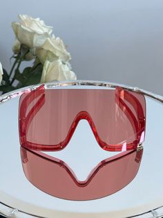 Brand new Gucci GG1631S 001 Sunglasses. Color: Red. Shape: Oversized Mask. Lens Width: 99mm. Lens Bridge: 1mm. Arm Length: 125mm. Lens Color: Tinted Red. Features: No comments needed. These speak for themselves. Made in: Italy. Retail Price: $390. Arrives in Gucci jewel-toned velvet case with matching satin pouch, cleaning cloth, and authenticity card. All items are guaranteed 100% authentic and brand new. Rimless Glass Shield Sunglasses With Uva Protection, Modern Pink Shield Sunglasses For Outdoor, Gucci Red Sunglasses With Uv Protection, Red Gucci Sunglasses With Uv Protection, Rimless Glass Shield Sunglasses With Tinted Lenses, Red Rimless Sunglasses For Party, Gucci Sunglasses With Uv Protection And Glass Material, Gucci Pink Sunglasses With Uv Protection, Pink Gucci Sunglasses With Uv Protection