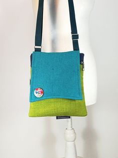 "This designed Canvas small bag is a great bag for daily use. It consists of a variety of fabric which makes it unique and beautiful. The bag is closed by a zipper and  Another  back pocket closed with a zipper, great safe storage of objects / Mobile Phone . The straps are soft and can be adjusted. on the bag a designed button that adds nice chiq to the bag  A perfect small zipper purse cross body bag for people who are minimalist.  --------------------------------------------------------------- Eco-friendly Green Crossbody Bag, Green Phone Bag With Adjustable Strap For Travel, Versatile Green Phone Bag For Travel, Eco-friendly Green Pouch Shoulder Bag, Green Crossbody Phone Bag For Travel, Green Square Shoulder Bag With Cell Phone Pocket, Green Pouch Shoulder Bag With Cell Phone Pocket, Versatile Green Phone Bag With Adjustable Strap, Green Phone Bag With Removable Pouch For Travel