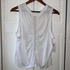 White Tank Top With Mesh Back Sleeveless Athleisure Tops For Day Out, White Athleisure Tops For Day Out, White Moisture-wicking Tank Top For Sports Season, White Athletic Fit Moisture-wicking Tank Top, Cheap White Moisture-wicking Tank Top, Nylon Gym Tank Top With 4-way Stretch, White Moisture-wicking Medium Support Tank Top, Old Navy Tank Tops, Active Tank Tops