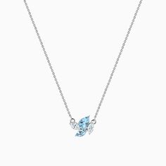 Alluring with its ethical beauty, this Ecksand aquamarine and diamond necklace is a timeless classic with a modern twist. The tranquil shades of blues and whites are mesmerizing when contrasted with the high-end recycled gold chain. Accent stones: Aquamarines, diamond, VS2+/F+, total 0.75 ctwChain width: 1 mm approx.Chain length: 16 / 18 in.Chain type: Diamond-cut trace chainClosure: Lobster clasp Fine Jewelry Aquamarine Light Blue Necklace, Light Blue Aquamarine Necklace Fine Jewelry, Fine Jewelry Light Blue Aquamarine Necklace, Light Blue Diamond Necklace For Anniversary, Light Blue Fine Jewelry Necklace For Anniversary, Modern Blue Diamond Necklace, Types Of Diamonds, Aqua Marine, Recycled Gold