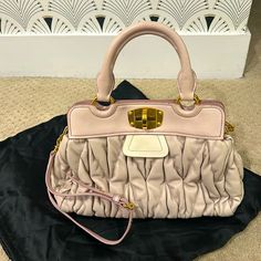 Authentic Miu Miu Crossbody Bag Blush ( Light Pink ) And Beige. Leather With Gold-Tone Hardware. Single Shoulder Strap & Pleated Accents. Satin Lining & Triple Interior Pockets & Turn Lock Closure At Front. Minor Patina On Front-Side Leather. Chic Miu Miu Shoulder Bag With Detachable Handle, Beige Miu Miu Shoulder Bag For Everyday Use, Miu Miu Beige Shoulder Bag For Everyday, Chic Miu Miu Shoulder Bag With Detachable Strap, Luxury Beige Miu Miu Bag, Miu Miu Beige Bags For Everyday Use, Miu Miu Beige Bags For Everyday, Elegant Miu Miu Satchel Shoulder Bag, Miu Miu Shoulder Bag For Evening