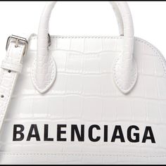 Condition: Very Good Material: White Calfskin Leather Base Length: 7.25 In Height: 5.75 In Width: 3.25 In Drop: 2 In Drop: 23 In Comes With: Strap And Dust Bag See Photos For Sign Of Use Original Price: $1,850 + Tax Balenciaga First, Bags Balenciaga, Balenciaga Leather, Motorcycle Bag, Croc Leather, Balenciaga Bag, City Bag, Givency Antigona Bag, Day Bag