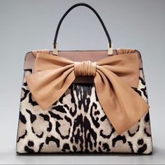 100% Authentic Valentino Aphrodite Calf Hair Leopard Print Bow Satchel. There Is A Slight Blemish On The Left Side Of The Bow; Otherwise, This Beauty Is In Excellent Condition! Comes With Dust Bag, Receipt, Cards, And Price Tag. Retail $2,795. On-Trend Leopard Print Introduces The Oolala To This Ladylike Shopper Wrapped Up With The Signature Valentino Bow. * Dyed, Stenciled, Brightened Calf Hair (Italy) Pieces. * Golden Hardware. * Top Handle; 5" Drop. * Leather Flap Top With Magnetic Snap Front. * Large Bow Accents Front Flap With Gathered Sides Wrapping Over Top. * Inside, One Zip And Two Open Pockets. * Black Satin Lining. * Metal Feet Protect Bottom Of Bag. * 14"H X 11"W X Photography Tattoo, Leopard Bag, Valentino Handbags, Animal Print Fashion, Handbag Heaven, Va Va Voom, Large Bow, Calf Hair, An Animal