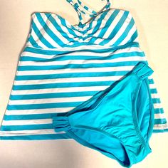 New Without Tags. Overstock Inventory. Two Separates Paired Together. Material And Shade As Pictured. New Mossimo Top M Bottom S Blue White Stripe Bandeau Bikini Swimwear 2pc N001 Top - Mossimo. Blue/White Stripes; Size M. Bandeau Tankini Top With Halter Straps. Bottom - Mossimo; Blue Bikini; Size S. Cute Blue Swimsuit, Blue Bandeau Halter Top For Swimming, Blue Bandeau Halter Top For Pool, Blue Bandeau Halter Top For Beach, Blue Sleeveless Halter Top For Sunbathing, Blue Bandeau Halter Top For Summer, Blue Strapless Tankini For Vacation, Blue Strapless Tankini For Beach, Strapless Blue Tankini For Vacation