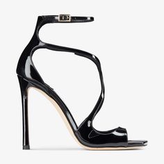 Sharp and distinct, our AZIA sandals are presented in black patent leather and showcase signature delicate curved straps that flatteringly snake up your feet. This Italian-crafted pair features a slim heel and a modern square toe.