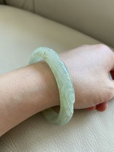 "🌈 Jade Bangle 58.6mm (2.31\"), Round Shape, Light Green 🌷 Untreated Natural Jadeite/ Grade A Jade 🌷 Certified : Yes 🌷 Jade from Myanmar/ Burma 🌷 Shape : Round 🌷 Inner diameter : 58.6mm / 2.31\" 🌷 Width & Thickness : 11.3 x 7.6mm 🌷 Color : Light Green 🌷 Free standard shipping from Hong Kong with tracking included 🌷 Take approximately 7-21 days to arrive worldwide ❤️ In Chinese Culture: Young people wear jade pendant will have a prosperous life, attracts good luck and friendship Old Carved Round Bangle For Formal Occasions, Carved Round Bangle For Formal Events, Carved Round Wedding Bracelets, Wedding Carved Round Bracelets, Carved Round Bracelets For Wedding, Carved Formal Bangle, Carved Jade Bracelets, Elegant Carved Green Bangle, Elegant Green Carved Bangle