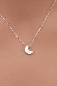 This lovely necklace makes a beautiful, lasting gift. I make this using 925 sterling silver chain and spring clasp. The crescent moon charm is a metal alloy with shiny silver finish and measures approximately 1/2 inch tall. It moves freely along the chain. Comes in a gift box, perfect for gift-giving. This piece looks great when paired with a star necklace. See 5th photo for both necklaces together. Listing is for moon necklace only but star necklace can be purchased here: www.etsy.com/listing/2 Silver Moon Necklace, Moon Necklace Silver, Long Drop Earrings, Silver Moon, Moon Charm, Lovely Necklace, 925 Sterling Silver Chain, Moon Necklace, Minimalist Necklace