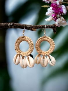 Shell Earrings * Beige Hoops * Handmade Gift * Beach Summer Jewelry * Gift for Her These beautiful handmade earrings are the perfect addition to your beach, summer or vacation attire. The woven hoop is 3 cm (1.18 in) across. The hoops are done in a simple khaki colour which compliments the 3 natural cowrie shells that hang from them.  These make the perfect gift for that special person such as mom, sister, friend, daughter, co-worker, bride, in-law and more. Vacation Attire, Khaki Colour, Cowrie Shells, Handmade Gifts For Her, Cowrie Shell, Shell Jewelry, Wedding Jewelry Earrings, Shell Earrings, Shell Beads