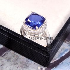 "Stone Name = Lab Created Tanzanite Gemstone color = Blue Stone Shape = Cushion Cut Stone Size = 10X10 mm Quality :- AAA Metal:- 925 Sterling silver Handmade Jewelry Ring JEWELRY RING FOR ALL OCCASION Don't miss this opportunity to own this beautiful Gemstone RING Your order will be handmade and ready for shipment in 3 to 5 Business days. Normally we ship via DHL eCommerce it takes 3 to 4 weeks if you need faster delivery You can select Shipping in your cart. AFGEMSNJEWELLERY https://www.etsy.co Silver Cushions, Tanzanite Engagement Ring, December Birthstone Ring, Silver Handmade Jewelry, Handmade Jewelry Ring, Tanzanite Stone, Tanzanite Ring, Sterling Silver Jewelry Handmade, Tanzanite Gemstone