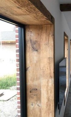 the inside of a house with wood siding