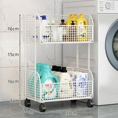 a washing machine next to a laundry basket with cleaning products in it and measurements for the size