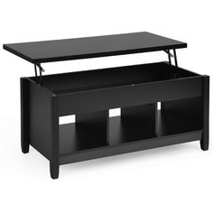 a black coffee table with two cubby bins underneath it and an open shelf below the top