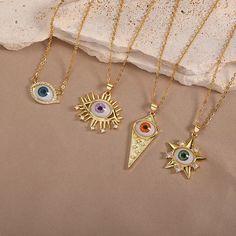 Make a statement with these gold plated 14l evil eye necklace. Spiritual Gold Eye-shaped Necklace, Spiritual Metal Evil Eye Necklace, Spiritual Evil Eye Metal Necklace, Gold Eye Necklace With Diamond Eyes, Gold Evil Eye Necklace, Star And Moon Necklace, Pendant Minimalist, Evil Eye Necklace Gold, Goth Jewelry