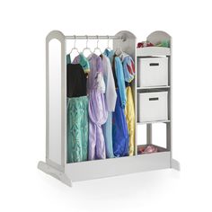 an open closet with clothes hanging on hooks