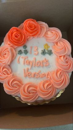 there is a birthday cake in the box with roses on it that says 13 taylors versum