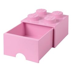 a pink lego storage box with two drawers and three knobs on the top shelf