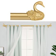 the gold swan is hanging on the curtain rod