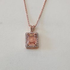 "Warm up your style with the beautiful pink hues of this morganite and diamond pendant necklace, set in elegant rose gold. This necklace is made of solid 14k yellow gold and set with natural morganite and diamonds. WHAT WILL YOU GET IN THIS PURCHASE? * A beautiful morganite necklace * Elegant jewelry box pack * Free DHL express worldwide shipping * Certificate of authenticity SPECS: MATERIAL: Solid 14k rose gold WEIGHT: 2.80 gram MAIN GEMSTONE: Morganite DIAMONDS: Natural DIAMOND QUANTITY: 24 DIAMOND CT WEIGHT: 0.16 ct DIAMOND CLARITY: VS1 DIAMOND COLOR: G Morganite and diamonds necklace 14k rose gold handmade pendant natural pink gemstone rectangle halo diamond charm CUSTOM AND PERSONALIZED ORDERS: I gladly accept personalized order, so you can get unique pieces made just for you. WHOLESA Luxury Rose Gold Plated Diamond Necklace, Luxury Rose Gold Necklaces With Single Cut Diamonds, Gold Morganite Jewelry With Diamond Accents, Rose Gold Sterling Silver Rectangular Pendant, Rose Gold Sterling Silver Rectangular Pendant Jewelry, Rose Gold Sterling Silver Jewelry With Rectangular Pendant, Gold Morganite Jewelry With Halo Setting, Yellow Gold Morganite Jewelry With Diamond Accents, Elegant Pink Gold Morganite Jewelry