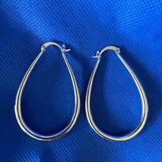 New Large Silver Tone Teardrop Pierced Earrings New In Package, Never Worn. They Measure About 2” Long, And1.5” At The Widest Part Hypoallergenic Teardrop Hoop Earrings For Formal Occasions, Hypoallergenic Teardrop Hoop Earrings For Formal Events, Classic Hypoallergenic Teardrop Hoop Earrings, Earrings Color, Pierced Earrings, Earings Piercings, Silver Tone, Jewelry Earrings, Women Jewelry