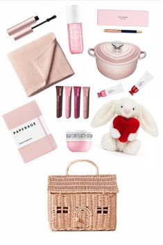 a bunch of items that are on top of a white surface, including a pink bag