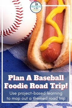 a hot dog with mustard on it next to a baseball