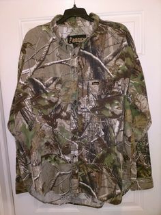 Rocky Woodland Camouflage Hunting Long Sleeve Button-down Shirt Men's XL Green. Condition is used. Ships first class mail. Camouflage Long Sleeve Cotton Shirt, Long Sleeve Camouflage Cotton Shirt, Button Down Shirt Mens, First Class, Military Jacket, Rocky, Camouflage, Button Downs, Down Shirt