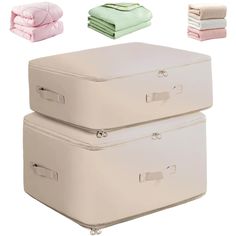 two suitcases are stacked on top of each other with folded towels in the background