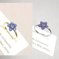 Thank you for visiting Fleur_Belles! The tiny real forget me not flower is pressed and coated with clear resin.  Forget me nots are symbolic of true love and remembrance making this ring perfect for gifting to a loved one or to wear in memory of somebody special. A lovely addition too for those who love dainty, minimal jewels. Ring size: adjustable with 1.8mm inner diameter as standard.  Real Flower Size: around 0.9cm 🌺Due to the handmade nature of this product, slight variations may occur, however, the design remains as similar as possible. 💖CARE about the handmade earrings💖 Please keep in a dry place and avoid prolonged direct sunlight, water, chemicals and perfumes to maintain and preserve the earrings beauty. Adjustable Blue Flower Ring, Flower Shaped Ring With Pressed Flowers For Gift, Gift Flower Ring With Pressed Flowers, Adjustable Blue Flower Ring For Gifting, Adjustable Blue Flower Ring Gift, Forget Me Not Ring, Crane Earrings, Flowers Ring, Flower Rings