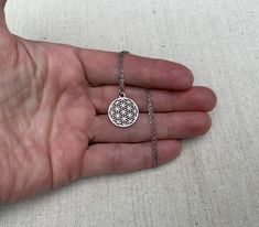 "Here is a very cool and intricately detailed mandala pendant necklace. It is simple yet stunning. This would make the perfect everyday necklace for any stylish lady. The pendant measures 3/4\" long by 5/8\" long. Made from allergy free plated silver. It hangs from a shiny strong 18\" stainless steel necklace chain with a lobster clasp. I have matching earrings in my shop if you would like the whole set. Here is a direct link https://etsy.me/2Y4edzo Thanks for stopping by! Please take a moment a Bohemian Hypoallergenic Necklace For Gift, Bohemian Stainless Steel Nickel Free Necklaces, Silver Medallion Long Necklace For Gift, Hypoallergenic Bohemian Necklace Gift, Hypoallergenic Metal Pendant Necklace, Bohemian Hypoallergenic Necklace Gift, Adjustable Bohemian Stainless Steel Necklaces, Bohemian Adjustable Stainless Steel Necklaces, Nickel Free Circular Spiritual Necklace