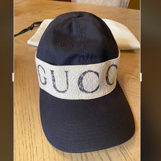 Authentic Gucci Headband Hat, Size Large, Brand New, Never Worn, That Hat Got Lost In My Huge Closet, The Hat Is Universal. Designer White Visor Hat, Black Wide Brim Hat With Embroidered Logo, Designer Adjustable Visor Hat, Luxury Adjustable Baseball Cap With Short Brim, Luxury Adjustable Visor Hat, Designer Black Brimmed Hat, Luxury Cream Flat Brim Hat, Designer White Flat Brim Hat, Designer Adjustable Baseball Cap With Short Brim