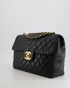 for more information on this item Brand - Chanel Model - Maxi Mademoiselle Colour - Navy Material - Lambskin Hardware - 24K Gold Accompanied by the original dust bag Measurements – 33cm x 24cm x 10cm Code - Please note the serial code is damaged & unreadable Ref - 027342 We are not affiliated with the brands we sell/ Please note that all of our items are unless stated otherwise and purchasing with us is contributing to an ethical and sustainable fashion future. All our items come with an . All s Luxury Double Flap Shoulder Bag For Formal Occasions, Luxury Bags With Gold Clasp For Formal Occasions, Classic Formal Bag With Gold Clasp, Classic Formal Bags With Gold Clasp, Formal Soft Leather Bag With Double Flap, High-end Gold Bags For Everyday Luxury, Luxury Evening Double Flap Shoulder Bag, Gold Leather Double Flap Bag, Gold Leather Bag With Double Flap