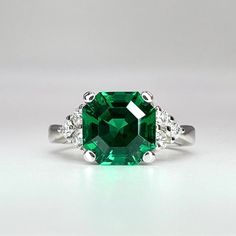 🐕 Big deals! Green emerald ring in 14K solid gold, asscher cut emerald engagement ring, emerald wedding ring, antique green emerald statement ring, #7940 only at $650.00 Hurry. #EmeraldRing #VintageEmeraldRing #EngagementRing #AntiqueEmerald #AsscherCut #MayBirthstoneRing #14kSolidGold #GreenEmeraldRing #StatementRing #WeddingRing Emerald Ring With Diamond Cut, Square Cut Emerald Ring With Accent Stones For Wedding, Formal Octagon Solitaire Emerald Ring, Elegant Square Cut Emerald Ring For Anniversary, Formal Octagon Emerald Diamond Ring, Timeless Asscher Cut Emerald Promise Ring, Formal Emerald Ring With Prong Setting, Timeless Green Emerald Ring With Accent Stones, Formal Octagon Emerald Ring May Birthstone