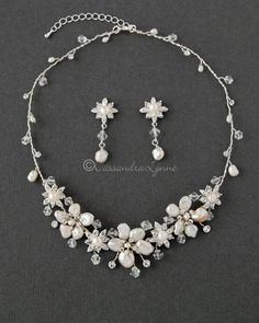 a necklace and earring set with pearls