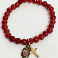 This Bracelet Is Of Polished Carnelian Gemstone Rounds At 4.8mm Strung On High Quality Elastic Beading Cord. The Small Cross Is 18k Gold Vermeil Over Silver. The Mary Charm Is Set In Brass. The Maximum Wrist Size Recommended Is 6 1/4” Inches Which Will Not Stress The Elastic Or Put ‘Gaps’ Between The Gemstones When Wearing The Smallest Wrist Size Is 4 1/2” So The Bracelet Won’t Slide Off. Measure Your Wrist With String All The Way Around, Then Measure Off A Ruler. Saint Barbara’s Wish (Sbw) Is M Saint Barbara, Crystal Bead Jewelry, Beading Cord, Small Crosses, Bead Jewelry, Making Jewelry, Stretch Bracelet, Semi Precious Gemstones, Stretch Bracelets