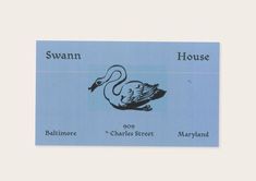 a blue business card with a swan on it