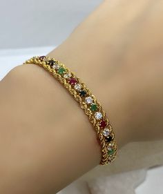 Colorful Bracelet, Gemstone Bracelet, Gold Bracelet, Chain Bracelet, Rope 14k Chain Bracelet, Gold Vintage Jewelry, Jewelry Gift, Wife Gift *100% natural gemstone *14k-18k solid gold *solid gold (NOT plated) *gemstone : ruby-sapphire-emerald-zircon *gemstone: 2.75 mm. *stone shape: round *stones emerald: 9 pcs. *stones ruby: 9 pcs. *stones sapphire : 9 pcs. *stone zircon : 28 pcs. *total gemstones : 55 pcs. Navaratna Bangles, Fantasy Jewelry Magic, Gold Vintage Jewelry, Antique Necklace Gold, Bracelet Rope, Gold Jewels Design, Antique Necklaces Design, Gold Bangles For Women, Ruby Earrings Studs