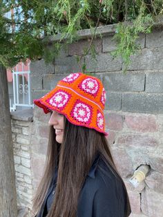 Granny Square orange pink Summer Hat has been carefully made for you with its stylish and eye-catching design. You will love the harmony of two colors and you will shine in the sun. Warm and lively colored soft cotton threads are used. *It is one size fits all* Do not hesitate to contact me for bucket hats in the desired colors. Washing information It can be washed in the hand wash program at 36F / 30C. You can lay it on a flat surface and dry it. Wish you have a good time in my shop. Thank you Winter Pink Bucket Hat, One Size, Pink Winter Bucket Hat, Pink Winter Bucket Mini Hat, Trendy Pink Brimmed Mini Hats, Adjustable Brimmed Orange Hat, Adjustable Orange Brimmed Hat, Fun Pink Bucket Hat, Fun Pink Beanie Hat, Pink Wide Brim Hat One Size