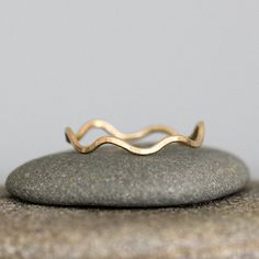 This set is for the sun worshippers and the beach combers, whose hearts keep pulling them to the sea. Simple and clean in aesthetic, yet imbued with all the timeless symbolism of the ocean waves and the rising sun. This is a set of two rings: one Sunrise Ring, and one Wave Ring. The two rings nestle perfectly together to create one elegant statement. Available in all sterling, sterling mixed with 14k gold fill, or all 14k gold fill All Rebecca Haas Jewelry is made by hand in my Southern Vermont Sunrise Ring, Southern Vermont, Sun Rising, Two Rings, Simple Organic, The Rising Sun, In Aesthetic, Light As A Feather, Stacking Ring Set