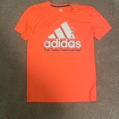 Orange Dry Fit Boy Xl Adidas Shirt Adidas Sports Shirt With Graphic Print, Adidas Sporty Shirt With Letter Print, Sporty Adidas Shirt With Letter Print, Sporty Orange Short Sleeve Shirt, Adidas Short Sleeve Shirt With Letter Print, Fit Boy, Colourful Wallpaper, Adidas Orange, Colourful Wallpaper Iphone