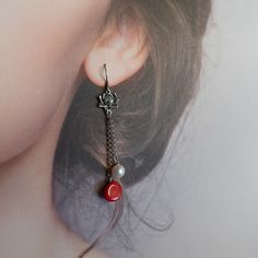 Exude old world elegance with every turn of your head with these handmade red coral sterling silver lotus earrings. The lotus in Chinese culture ranks as the highest of all flowers; it represents divinity and the best of the human spirit. Those delicate lotus earrings will remind you to be the best you can be each day you wear it. ⚜Item Specifics ❀ Natural Coral Dyed (10mm) ❀ Sterling Silver Ear Wire and Lotus ❀ Fresh Water Pearl 8mm ❀ Length: 2.5 Inch (65mm) Find more red coral jewelry here htt Elegant Red Flower Earrings With Ear Wire, Elegant Handmade Red Flower Earrings, Elegant Red Handmade Flower Earrings, Elegant Red Coral Dangle Earrings, Elegant Red Coral Drop Earrings, Elegant Red Coral Jewelry With Matching Earrings, Elegant Red Coral Earrings, Elegant Red Coral Jewelry With Natural Stones, Red Spiritual Jewelry