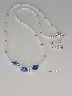 Blue daisy necklace, Gift for her, Bead Necklace, old money, Boho Chic Jewelry, Trending Jewelry,  seed bead blue flowers necklace, alicegem I hope you enjoy wearing my jewelry as much as I enjoy making them! This trendy necklace/chocker is a great addition to your beach look.   Let me know if you need your order to be shipped out faster. I will try my best to accommodate your needs. ♥ The best gift you could give to yourself or your friend. ♥  ↠ ABOUT    ▢  Size: about 15 inches, goes up to abo Blue Bohemian Necklace With Flower Charm, Blue Flower-shaped Jewelry With Spacer Beads, Blue Beaded Flower Jewelry, Blue Flower Necklace With Colorful Round Beads, Blue Flower Necklace With Tiny Beads, Blue Flower-shaped Beaded Jewelry, Blue Jewelry With Flower Charm And Round Beads, Blue Flower-shaped Beaded Necklaces With Colorful Beads, Handmade Blue Flower Beaded Necklaces