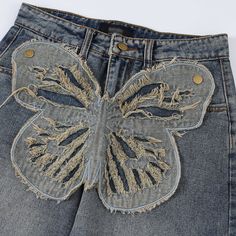 Discover the perfect blend of comfort and style with our Butterfly jeans from fnacha. Made with high-quality denim fabric and featuring a zip placket fly opening, these jeans are perfect for all seasons and leisure activities. With a straight type fit and a stylish street design, you'll feel confident and fashionable in any scenario. Available in sizes S-XXL and in a trendy blue color. Upgrade your wardrobe today! Fringe Butterfly, Back Of Jeans, Butterfly Jeans, Patchwork Denim Skirt, The Butterfly Effect, Street Aesthetic, Patch Jeans, Aelfric Eden, Top Streetwear Brands